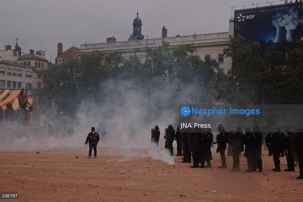 LYON, FRANCE, OCTOBER 17, 2026: Demonstrators clash with police at Place Bellecour in Lyon during nationwide protests against the high cost of living. Police use tear gas and a water cannon during the confrontations. A tourist information office on the square is ransacked and set on fire during the unrest. Photo by Julian Nelaj / JNA Press. (Photo by Julian Nelaj/JNA Press via Nexpher Images)