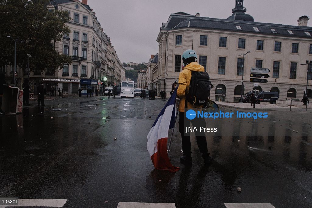 LYON, FRANCE, OCTOBER 17, 2026: Demonstrators clash with police at Place Bellecour in Lyon during nationwide protests against the high cost of living. Police use tear gas and a water cannon during the confrontations. A tourist information office on the square is ransacked and set on fire during the unrest. Photo by Julian Nelaj / JNA Press. (Photo by Julian Nelaj/JNA Press via Nexpher Images)