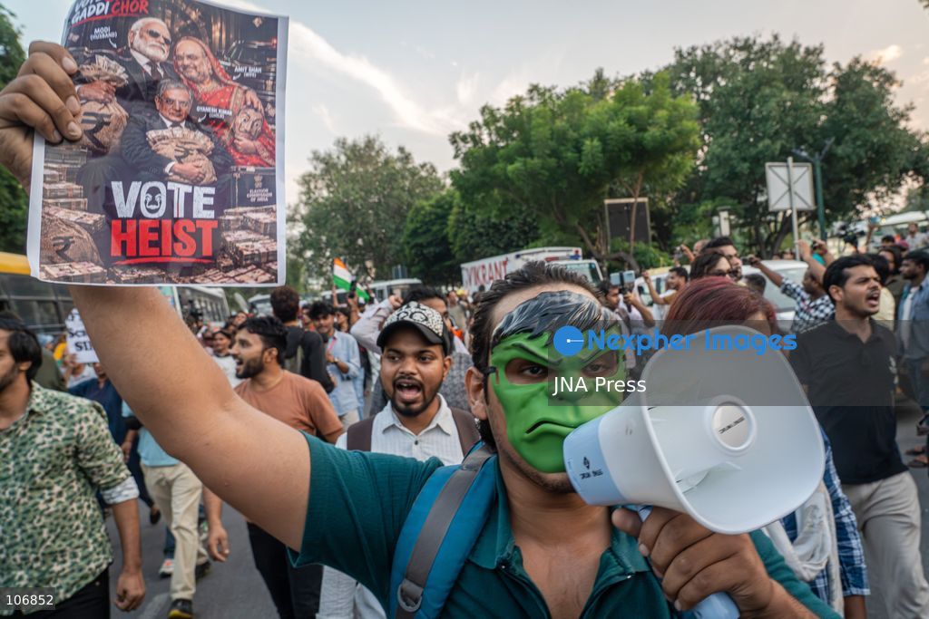 NEW DELHI, INDIA, OCTOBER 16, 2026: Protesters carry Indian national flags during the “Lehra Do Tiranga” (Wave the Tricolour) demonstration at Connaught Place in New Delhi. Called by the Cockroach Janta Party (CJP), the protest demands the resignation of Chief Election Commissioner Gyanesh Kumar over alleged irregularities linked to the Special Intensive Revision (SIR) of electoral rolls. Photo by Yanni Rawat / JNA Press. (Photo by yanni rawat/JNA Press via Nexpher Images)