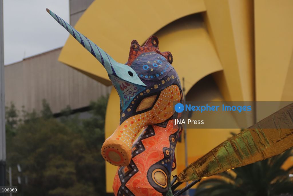 MEXICO CITY, MEXICO, OCTOBER 17, 2026: Participants accompany giant sculptures of fantastical creatures during the 18th Monumental Alebrijes Parade along Paseo de la Reforma in Mexico City. Organised by the Museo de Arte Popular (MAP), the annual event celebrates Mexican folk art and traditional craftsmanship. Photo by Carlos Santiago / JNA Press. (Photo by Carlos Santiago/JNA Press via Nexpher Images)