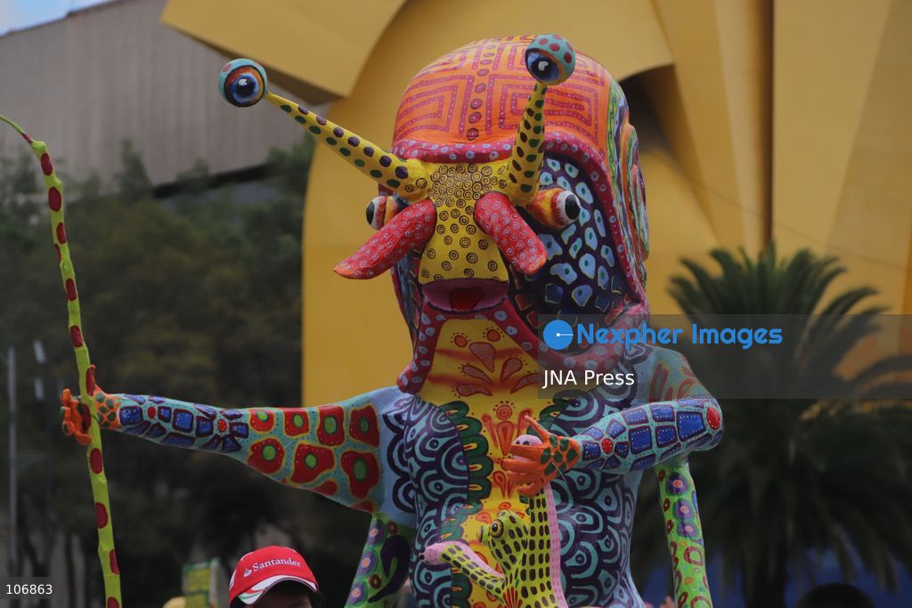 MEXICO CITY, MEXICO, OCTOBER 17, 2026: Participants accompany giant sculptures of fantastical creatures during the 18th Monumental Alebrijes Parade along Paseo de la Reforma in Mexico City. Organised by the Museo de Arte Popular (MAP), the annual event celebrates Mexican folk art and traditional craftsmanship. Photo by Carlos Santiago / JNA Press. (Photo by Carlos Santiago/JNA Press via Nexpher Images)