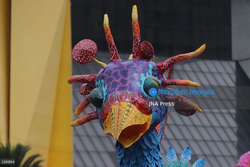 MEXICO CITY, MEXICO, OCTOBER 17, 2026: Participants accompany giant sculptures of fantastical creatures during the 18th Monumental Alebrijes Parade along Paseo de la Reforma in Mexico City. Organised by the Museo de Arte Popular (MAP), the annual event celebrates Mexican folk art and traditional craftsmanship. Photo by Carlos Santiago / JNA Press. (Photo by Carlos Santiago/JNA Press via Nexpher Images)