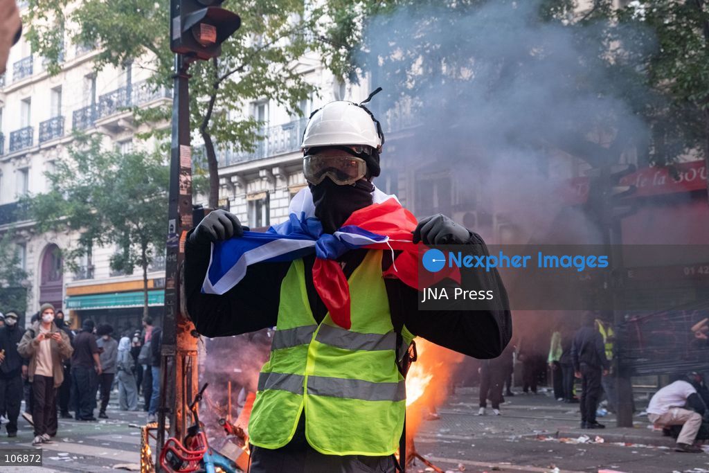 PARIS, FRANCE, OCTOBER 17, 2026: Demonstrators clash with riot police around Place de la République during protests involving high school students, Yellow Vest activists and other groups over education conditions and the high cost of living. Police use tear gas and water cannons during the confrontations. Photo by Camilla Baronetto / JNA Press. (Photo by Camilla Baronetto/JNA Press via Nexpher Images)