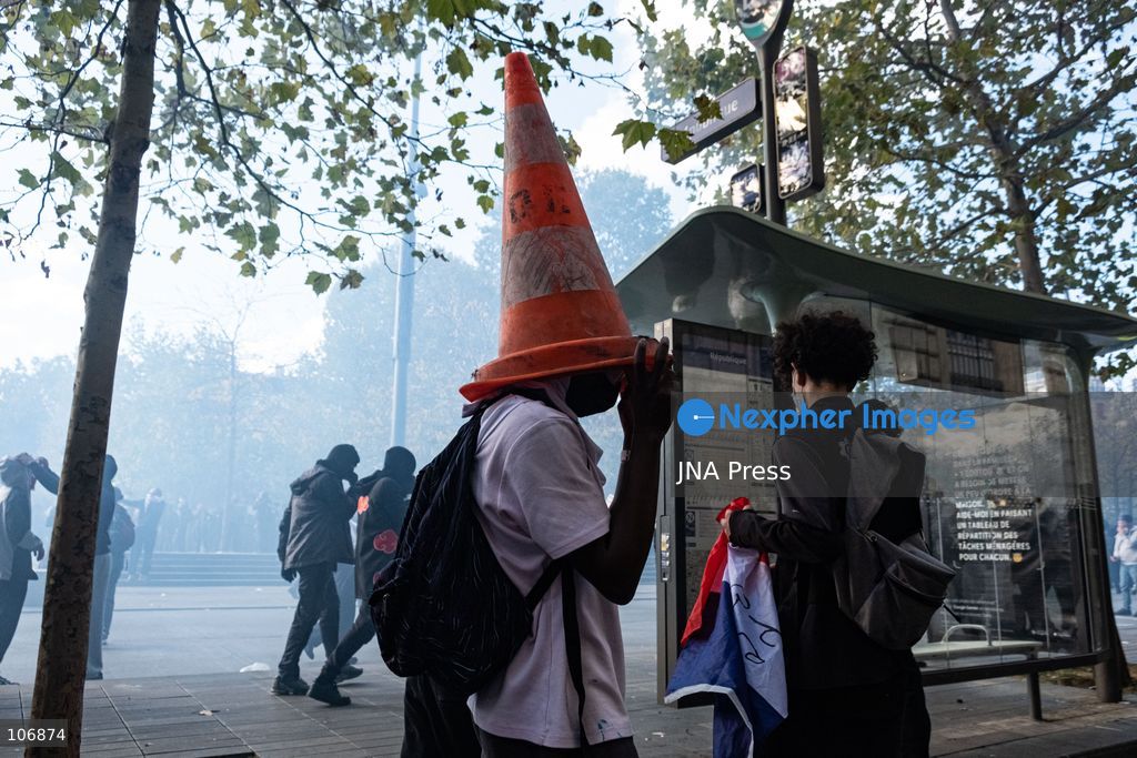 PARIS, FRANCE, OCTOBER 17, 2026: Demonstrators clash with riot police around Place de la République during protests involving high school students, Yellow Vest activists and other groups over education conditions and the high cost of living. Police use tear gas and water cannons during the confrontations. Photo by Camilla Baronetto / JNA Press. (Photo by Camilla Baronetto/JNA Press via Nexpher Images)