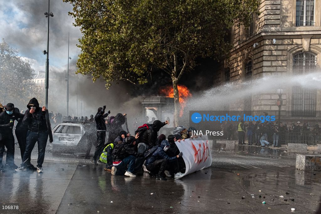 PARIS, FRANCE, OCTOBER 17, 2026: Demonstrators clash with riot police around Place de la République during protests involving high school students, Yellow Vest activists and other groups over education conditions and the high cost of living. Police use tear gas and water cannons during the confrontations. Photo by Camilla Baronetto / JNA Press. (Photo by Camilla Baronetto/JNA Press via Nexpher Images)