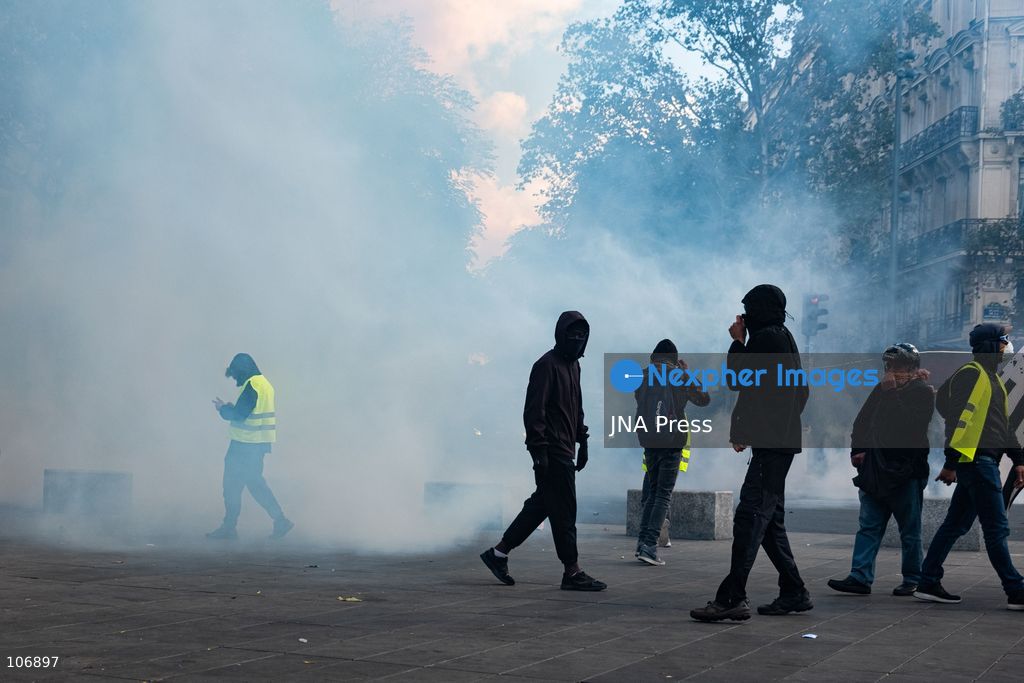 PARIS, FRANCE, OCTOBER 17, 2026: Demonstrators clash with riot police around Place de la République during protests involving high school students, Yellow Vest activists and other groups over education conditions and the high cost of living. Police use tear gas and water cannons during the confrontations. Photo by Camilla Baronetto / JNA Press. (Photo by Camilla Baronetto/JNA Press via Nexpher Images)