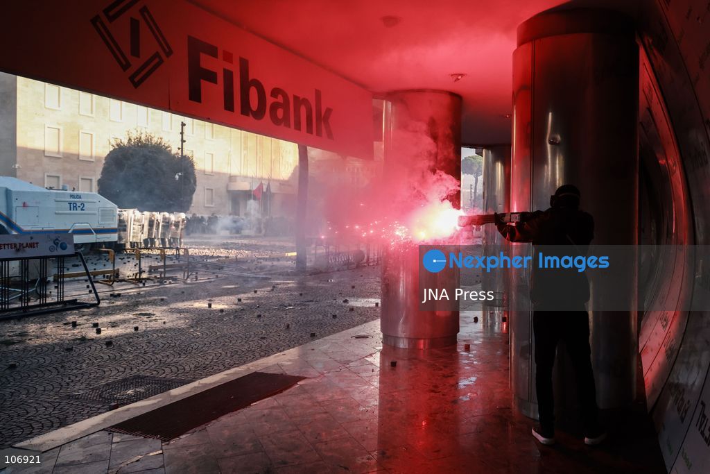 TIRANA, ALBANIA, OCTOBER 17, 2026: Demonstrators clash with riot police near the Prime Minister’s Office during student-led anti-government protests in central Tirana. Protesters throw stones and pyrotechnics, while police use tear gas, water cannons and rubber bullets. Fires break out at the High Court and the entrance to a Bank of Albania building as unrest continues for a fifth consecutive day. Demonstrators demand better university conditions and the resignation of Prime Minister Edi Rama. Photo by Vlasov Sulaj / JNA Press. (Photo by Vlasov Sulaj/JNA Press via Nexpher Images)