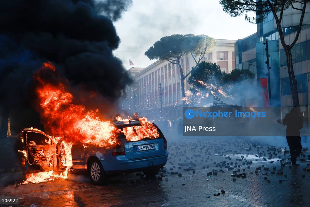 TIRANA, ALBANIA, OCTOBER 17, 2026: Demonstrators clash with riot police near the Prime Minister’s Office during student-led anti-government protests in central Tirana. Protesters throw stones and pyrotechnics, while police use tear gas, water cannons and rubber bullets. Fires break out at the High Court and the entrance to a Bank of Albania building as unrest continues for a fifth consecutive day. Demonstrators demand better university conditions and the resignation of Prime Minister Edi Rama. Photo by Vlasov Sulaj / JNA Press. (Photo by Vlasov Sulaj/JNA Press via Nexpher Images)
