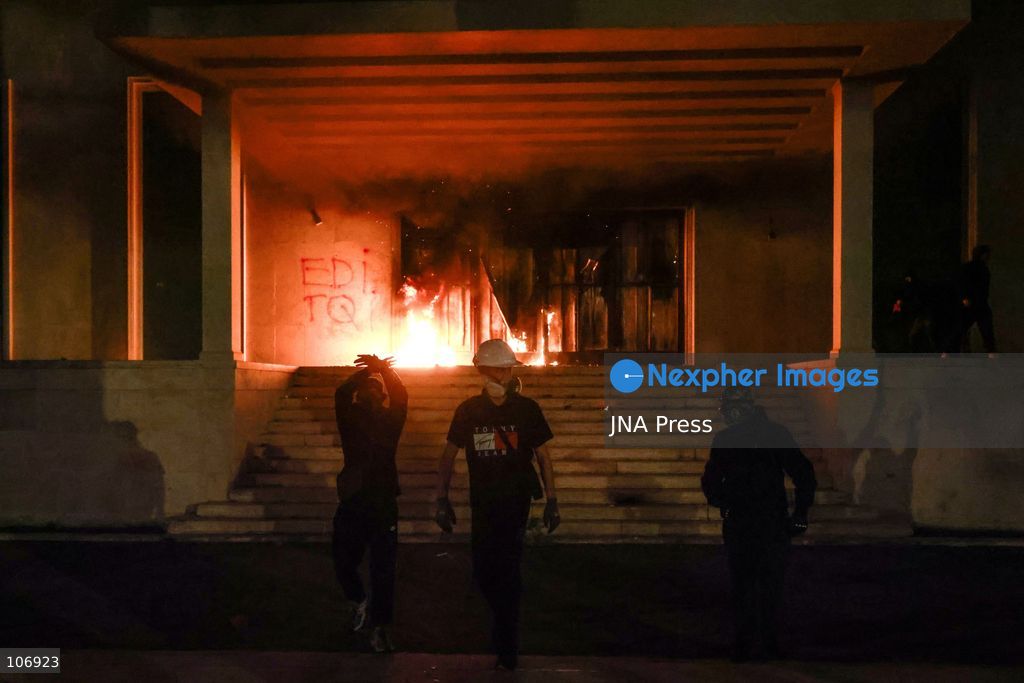 TIRANA, ALBANIA, OCTOBER 17, 2026: Demonstrators clash with riot police near the Prime Minister’s Office during student-led anti-government protests in central Tirana. Protesters throw stones and pyrotechnics, while police use tear gas, water cannons and rubber bullets. Fires break out at the High Court and the entrance to a Bank of Albania building as unrest continues for a fifth consecutive day. Demonstrators demand better university conditions and the resignation of Prime Minister Edi Rama. Photo by Vlasov Sulaj / JNA Press. (Photo by Vlasov Sulaj/JNA Press via Nexpher Images)