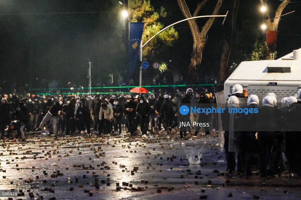 TIRANA, ALBANIA, OCTOBER 17, 2026: Demonstrators clash with riot police near the Prime Minister’s Office during student-led anti-government protests in central Tirana. Protesters throw stones and pyrotechnics, while police use tear gas, water cannons and rubber bullets. Fires break out at the High Court and the entrance to a Bank of Albania building as unrest continues for a fifth consecutive day. Demonstrators demand better university conditions and the resignation of Prime Minister Edi Rama. Photo by Vlasov Sulaj / JNA Press. (Photo by Vlasov Sulaj/JNA Press via Nexpher Images)