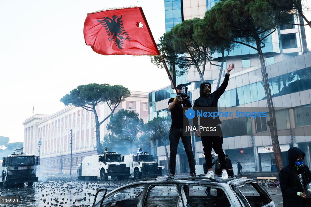 TIRANA, ALBANIA, OCTOBER 17, 2026: Demonstrators clash with riot police near the Prime Minister’s Office during student-led anti-government protests in central Tirana. Protesters throw stones and pyrotechnics, while police use tear gas, water cannons and rubber bullets. Fires break out at the High Court and the entrance to a Bank of Albania building as unrest continues for a fifth consecutive day. Demonstrators demand better university conditions and the resignation of Prime Minister Edi Rama. Photo by Vlasov Sulaj / JNA Press. (Photo by Vlasov Sulaj/JNA Press via Nexpher Images)