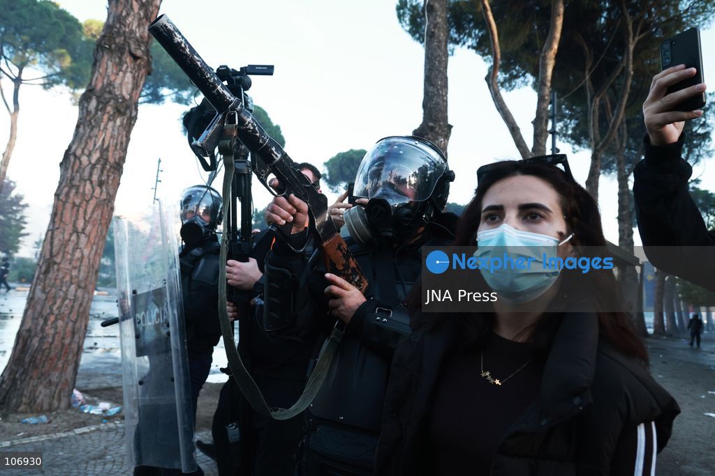 TIRANA, ALBANIA, OCTOBER 17, 2026: Demonstrators clash with riot police near the Prime Minister’s Office during student-led anti-government protests in central Tirana. Protesters throw stones and pyrotechnics, while police use tear gas, water cannons and rubber bullets. Fires break out at the High Court and the entrance to a Bank of Albania building as unrest continues for a fifth consecutive day. Demonstrators demand better university conditions and the resignation of Prime Minister Edi Rama. Photo by Vlasov Sulaj / JNA Press. (Photo by Vlasov Sulaj/JNA Press via Nexpher Images)