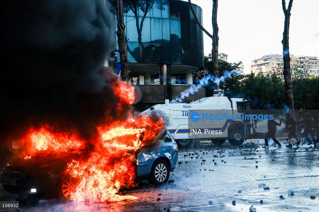 TIRANA, ALBANIA, OCTOBER 17, 2026: Demonstrators clash with riot police near the Prime Minister’s Office during student-led anti-government protests in central Tirana. Protesters throw stones and pyrotechnics, while police use tear gas, water cannons and rubber bullets. Fires break out at the High Court and the entrance to a Bank of Albania building as unrest continues for a fifth consecutive day. Demonstrators demand better university conditions and the resignation of Prime Minister Edi Rama. Photo by Vlasov Sulaj / JNA Press. (Photo by Vlasov Sulaj/JNA Press via Nexpher Images)