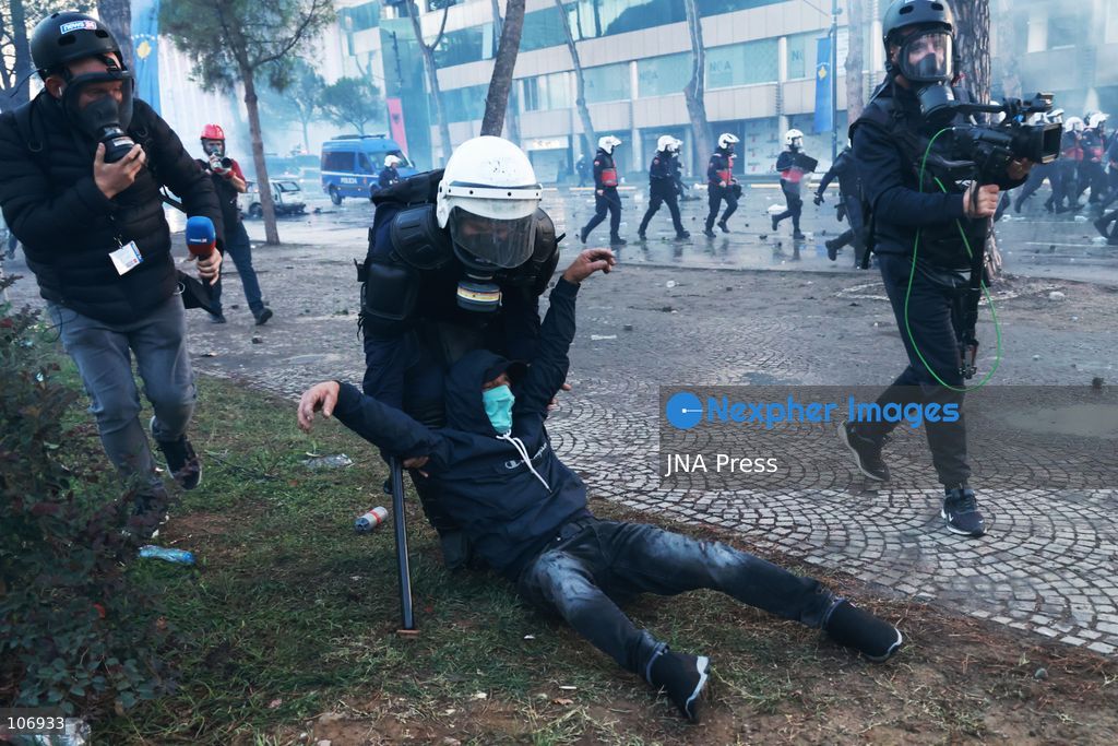 TIRANA, ALBANIA, OCTOBER 17, 2026: Demonstrators clash with riot police near the Prime Minister’s Office during student-led anti-government protests in central Tirana. Protesters throw stones and pyrotechnics, while police use tear gas, water cannons and rubber bullets. Fires break out at the High Court and the entrance to a Bank of Albania building as unrest continues for a fifth consecutive day. Demonstrators demand better university conditions and the resignation of Prime Minister Edi Rama. Photo by Vlasov Sulaj / JNA Press. (Photo by Vlasov Sulaj/JNA Press via Nexpher Images)
