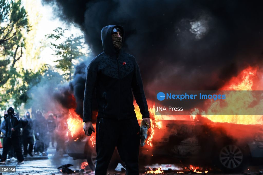 TIRANA, ALBANIA, OCTOBER 17, 2026: Demonstrators clash with riot police near the Prime Minister’s Office during student-led anti-government protests in central Tirana. Protesters throw stones and pyrotechnics, while police use tear gas, water cannons and rubber bullets. Fires break out at the High Court and the entrance to a Bank of Albania building as unrest continues for a fifth consecutive day. Demonstrators demand better university conditions and the resignation of Prime Minister Edi Rama. Photo by Vlasov Sulaj / JNA Press. (Photo by Vlasov Sulaj/JNA Press via Nexpher Images)