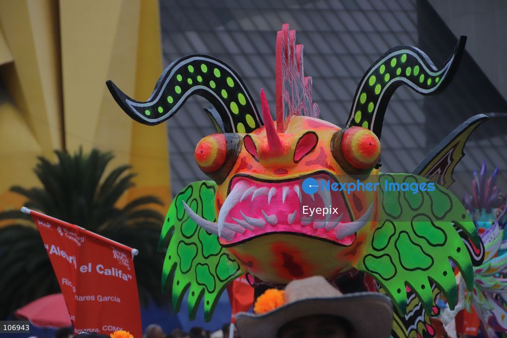 A giant, brightly colored fantastical folk-art sculpture crafted from papier-mâché, wood, and cardboard known as an "alebrije" is paraded down Paseo de la Reforma avenue during the 18th Monumental Alebrijes Parade. on October 17, 2026 in Mexico City, Mexico. (Photo by Carlos Santiago/ Eyepix Group) (Photo by Carlos Santiago/ Eyepix Group/Eyepix via Nexpher Images)
