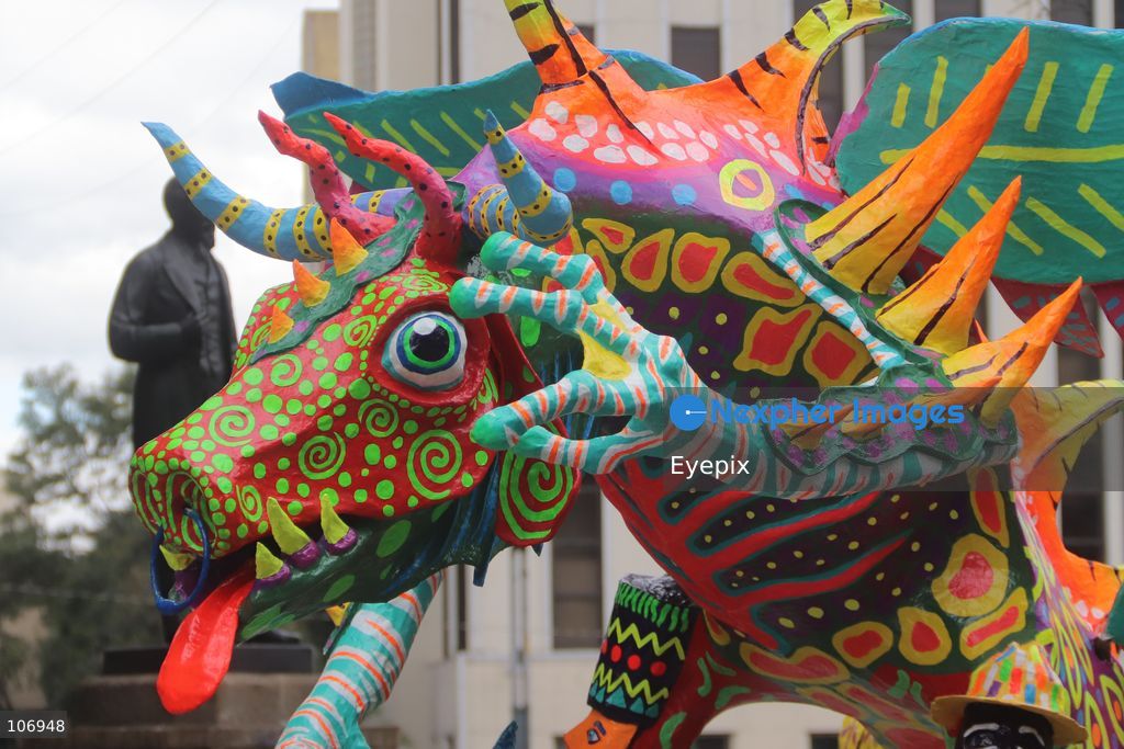 A giant, brightly colored fantastical folk-art sculpture crafted from papier-mâché, wood, and cardboard known as an "alebrije" is paraded down Paseo de la Reforma avenue during the 18th Monumental Alebrijes Parade. on October 17, 2026 in Mexico City, Mexico. (Photo by Carlos Santiago/ Eyepix Group) (Photo by Carlos Santiago/ Eyepix Group/Eyepix via Nexpher Images)
