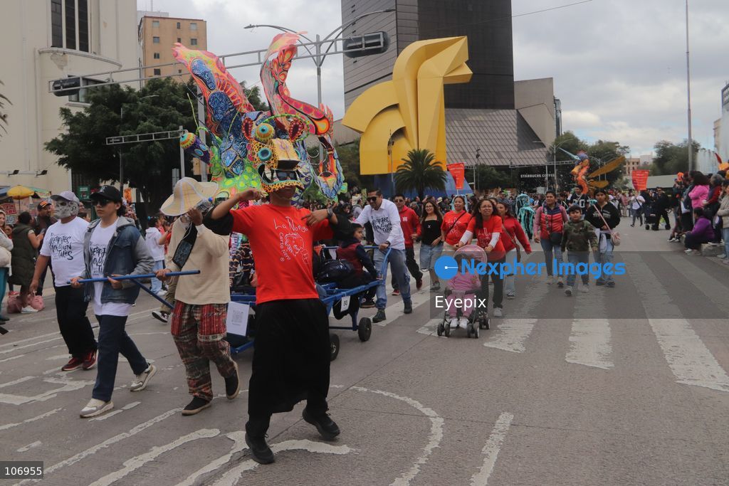 People taking part during the 18th Monumental Alebrijes Parade on Paseo de la Reforma avenue. on October 17, 2026 in Mexico City, Mexico. (Photo by Carlos Santiago/ Eyepix Group) (Photo by Carlos Santiago/ Eyepix Group/Eyepix via Nexpher Images)