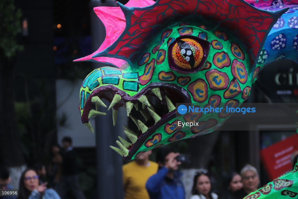 A giant, brightly colored fantastical folk-art sculpture crafted from papier-mâché, wood, and cardboard known as an "alebrije" is paraded down Paseo de la Reforma avenue during the 18th Monumental Alebrijes Parade. on October 17, 2026 in Mexico City, Mexico. (Photo by Carlos Santiago/ Eyepix Group) (Photo by Carlos Santiago/ Eyepix Group/Eyepix via Nexpher Images)