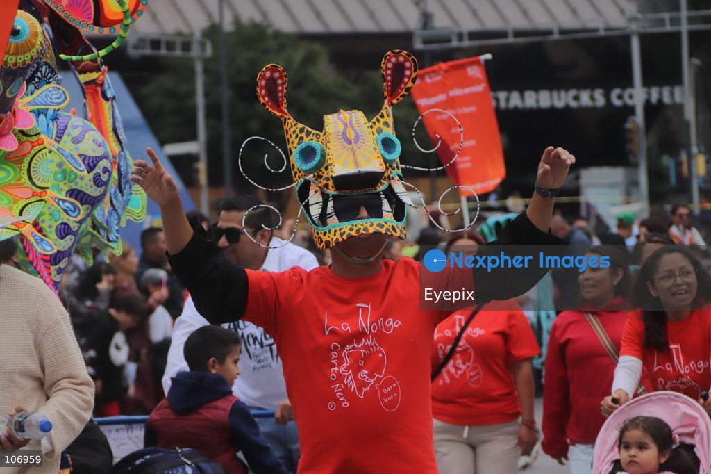 People taking part during the 18th Monumental Alebrijes Parade on Paseo de la Reforma avenue. on October 17, 2026 in Mexico City, Mexico. (Photo by Carlos Santiago/ Eyepix Group) (Photo by Carlos Santiago/ Eyepix Group/Eyepix via Nexpher Images)