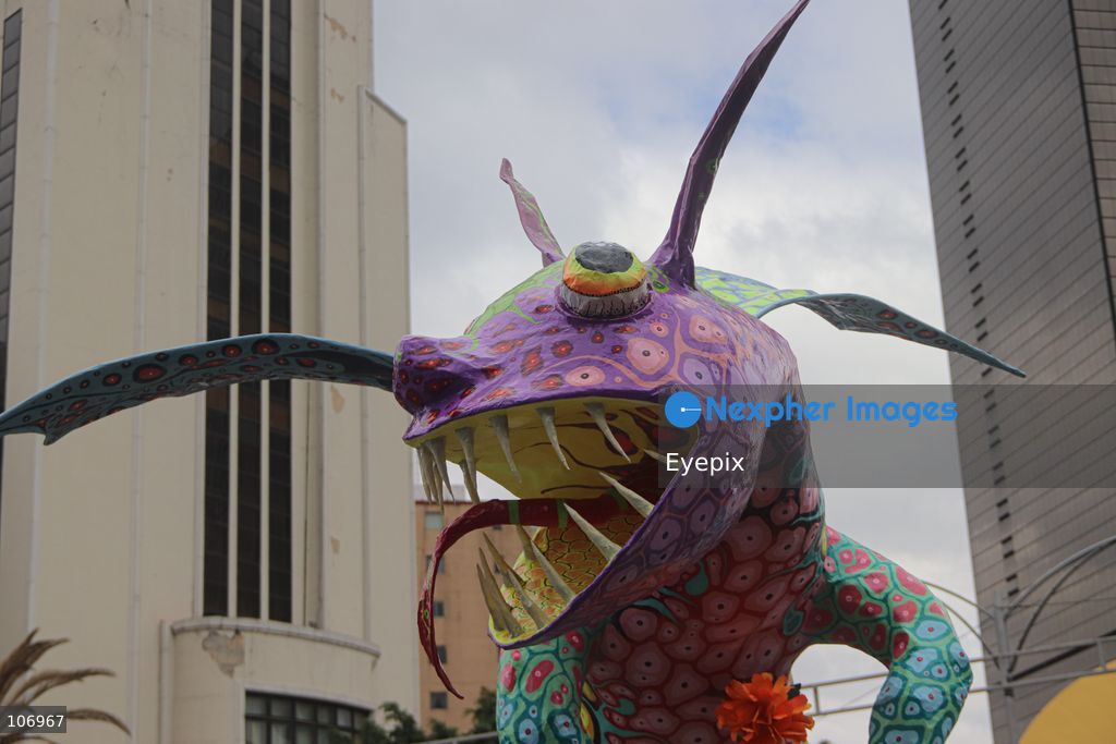 A giant, brightly colored fantastical folk-art sculpture crafted from papier-mâché, wood, and cardboard known as an "alebrije" is paraded down Paseo de la Reforma avenue during the 18th Monumental Alebrijes Parade. on October 17, 2026 in Mexico City, Mexico. (Photo by Carlos Santiago/ Eyepix Group) (Photo by Carlos Santiago/ Eyepix Group/Eyepix via Nexpher Images)