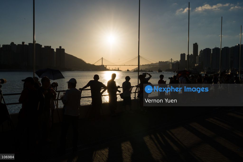 People viewing the sunset on October 18, 2026 in Hong Kong. (Photo by Vernon Yuen/Nexpher Images)