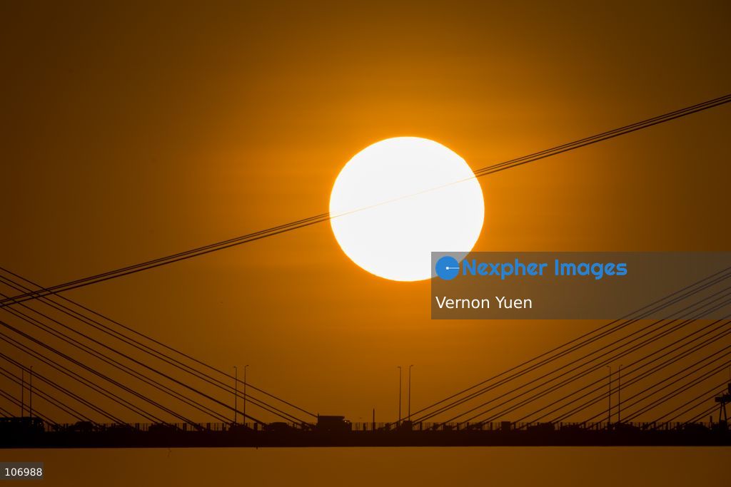 A sunset over a bridge on October 18, 2026 in Hong Kong. (Photo by Vernon Yuen/Nexpher Images)