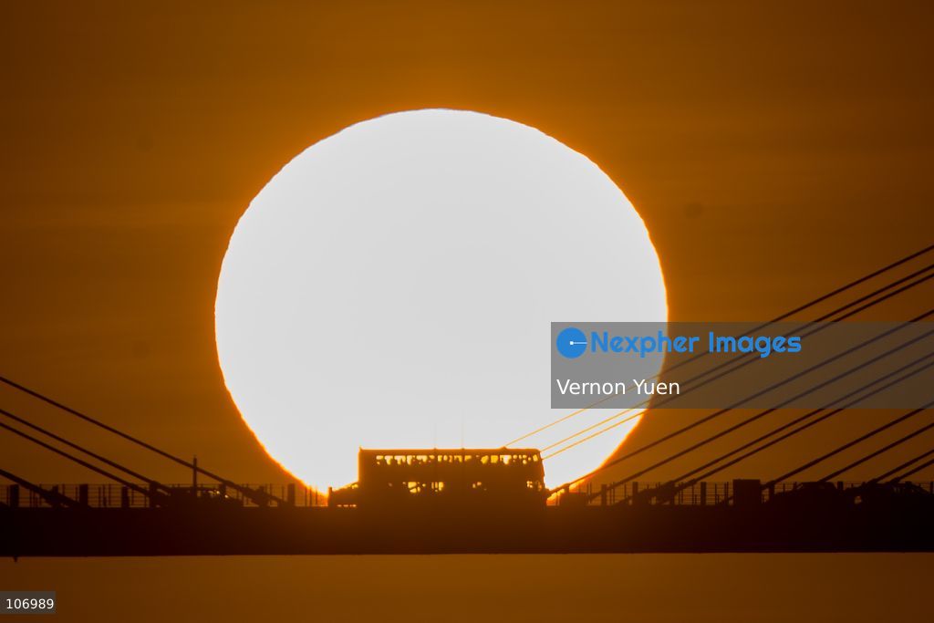 A sunset over a bridge on October 18, 2026 in Hong Kong. (Photo by Vernon Yuen/Nexpher Images)