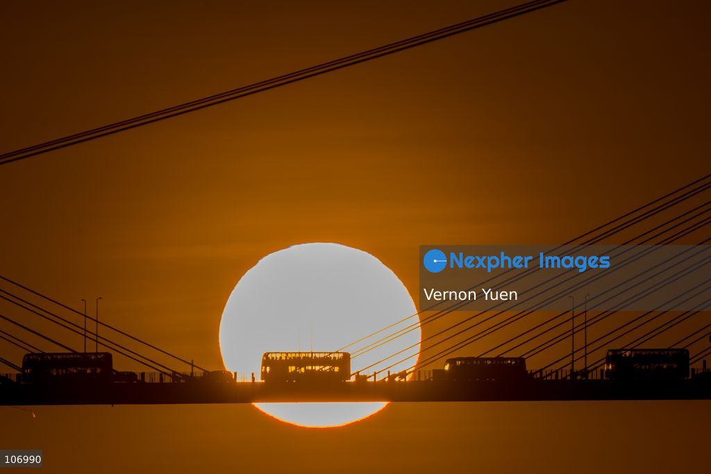 A sunset over a bridge on October 18, 2026 in Hong Kong. (Photo by Vernon Yuen/Nexpher Images)
