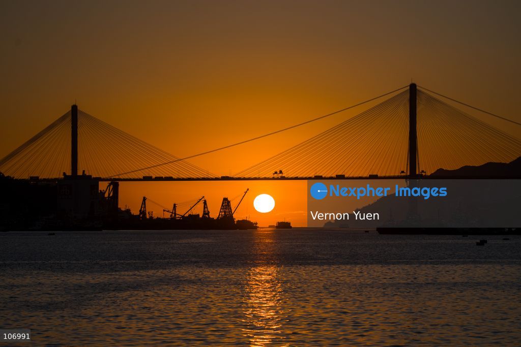 A sunset over a bridge on October 18, 2026 in Hong Kong. (Photo by Vernon Yuen/Nexpher Images)