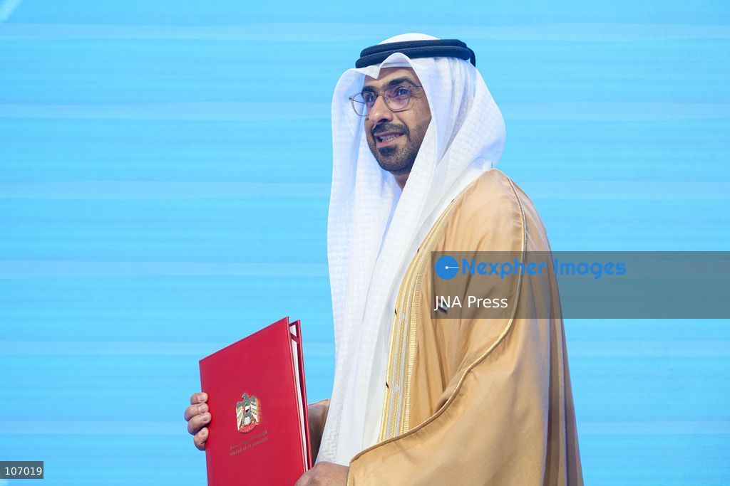 BANGKOK, THAILAND - OCTOBER 18, 2026: A UAE delegate holds a folder with the UAE insignia as UAE Central Bank Governor Khaled Mohamed Balama, UAE Finance Minister of State Mohamed bin Hadi Al Hussaini, World Bank Group President Ajay Banga and IMF Managing Director Kristalina Georgieva sign an agreement for the UAE to host the 2029 Annual Meetings. (Photo by Watsawat "James" Koktabtim/JNA Press via Nexpher Images)
