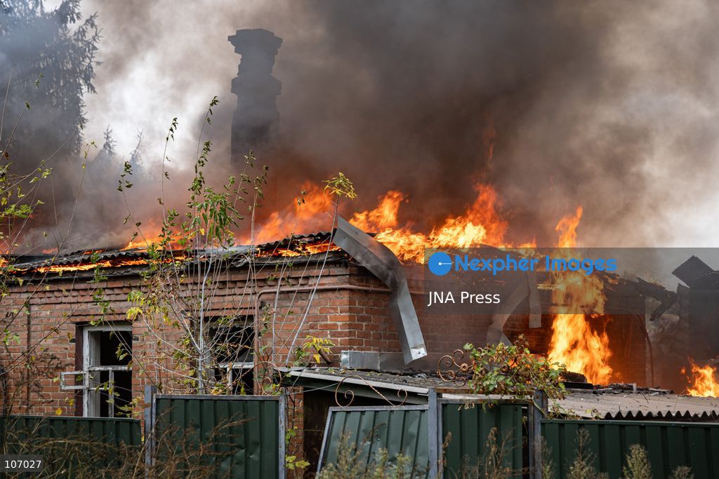 SLOVIANSK, UKRAINE, OCTOBER 17, 2026: Firefighters tackle a blaze at a residential house damaged by a Russian airstrike in Sloviansk, Donetsk region. The strike set the building’s remaining structures on fire. (Photo by Andrew Cling/JNA Press via Nexpher Images)