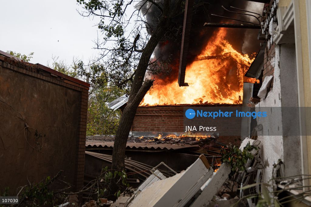 SLOVIANSK, UKRAINE, OCTOBER 17, 2026: Firefighters tackle a blaze at a residential house damaged by a Russian airstrike in Sloviansk, Donetsk region. The strike set the building’s remaining structures on fire. (Photo by Andrew Cling/JNA Press via Nexpher Images)