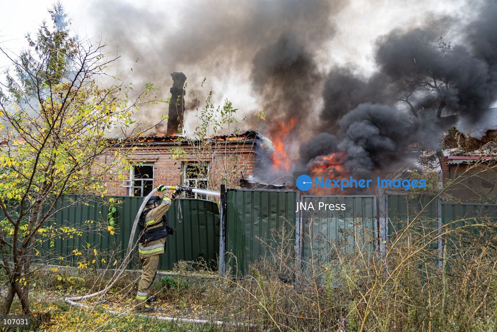 SLOVIANSK, UKRAINE, OCTOBER 17, 2026: Firefighters tackle a blaze at a residential house damaged by a Russian airstrike in Sloviansk, Donetsk region. The strike set the building’s remaining structures on fire. (Photo by Andrew Cling/JNA Press via Nexpher Images)