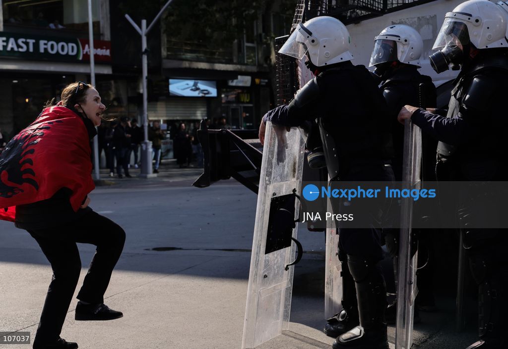 TIRANA, ALBANIA, OCTOBER 18, 2026: Demonstrators clash with riot police outside the Ministry of Education in Tirana as student-led anti-government protests continue for a sixth consecutive day. Protesters throw stones while police respond with tear gas, water cannons and rubber bullets. The demonstrations demand improved university conditions and the resignation of Prime Minister Edi Rama. (Photo by Vlasov Sulaj/JNA Press via Nexpher Images)