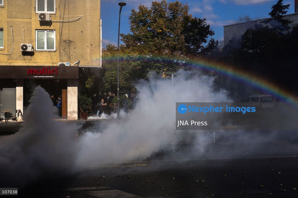 TIRANA, ALBANIA, OCTOBER 18, 2026: Demonstrators clash with riot police outside the Ministry of Education in Tirana as student-led anti-government protests continue for a sixth consecutive day. Protesters throw stones while police respond with tear gas, water cannons and rubber bullets. The demonstrations demand improved university conditions and the resignation of Prime Minister Edi Rama. (Photo by Vlasov Sulaj/JNA Press via Nexpher Images)