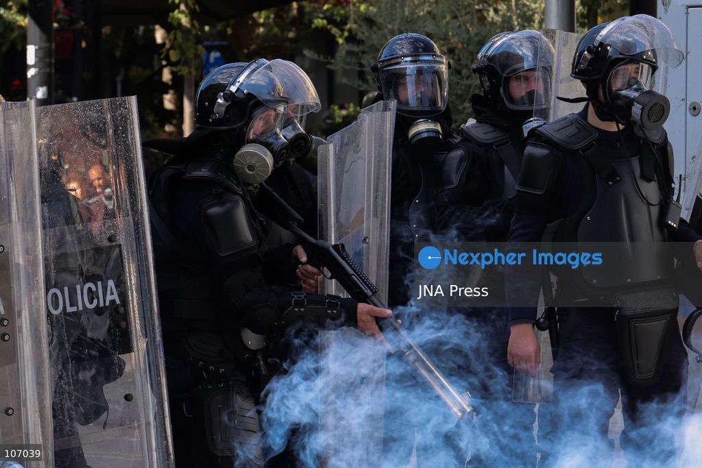 TIRANA, ALBANIA, OCTOBER 18, 2026: Demonstrators clash with riot police outside the Ministry of Education in Tirana as student-led anti-government protests continue for a sixth consecutive day. Protesters throw stones while police respond with tear gas, water cannons and rubber bullets. The demonstrations demand improved university conditions and the resignation of Prime Minister Edi Rama. (Photo by Vlasov Sulaj/JNA Press via Nexpher Images)