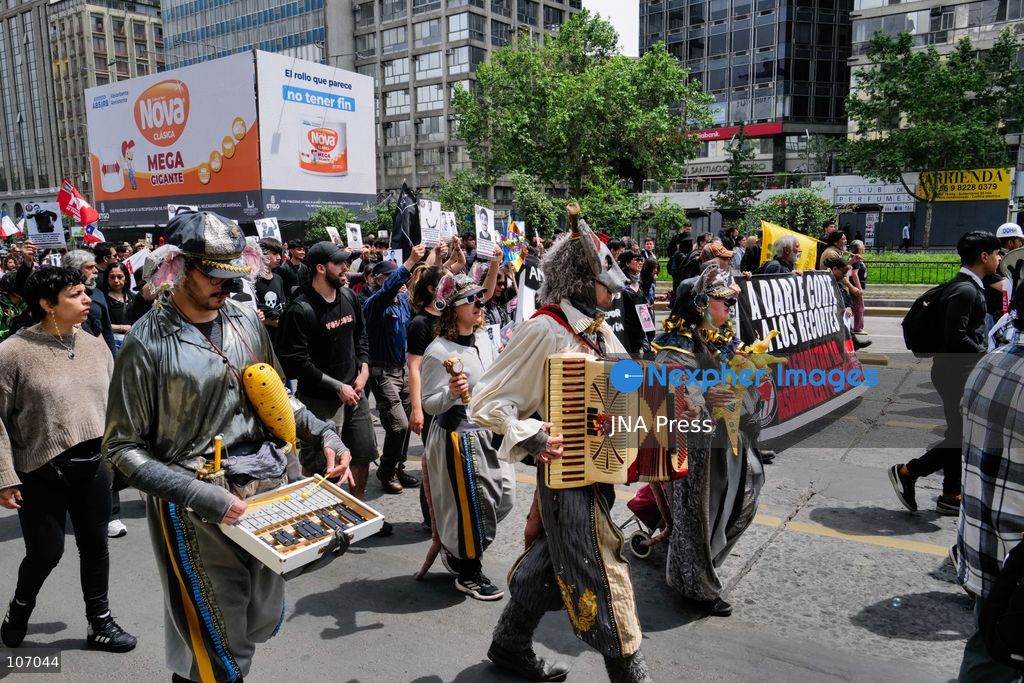 SANTIAGO, CHILE - OCTOBER 18, 2026: Musicians play as demonstrators march through the city center during the seventh anniversary of Chile's 2019 social uprising. (Photo by Pablo Zamorano/JNA Press via Nexpher Images)