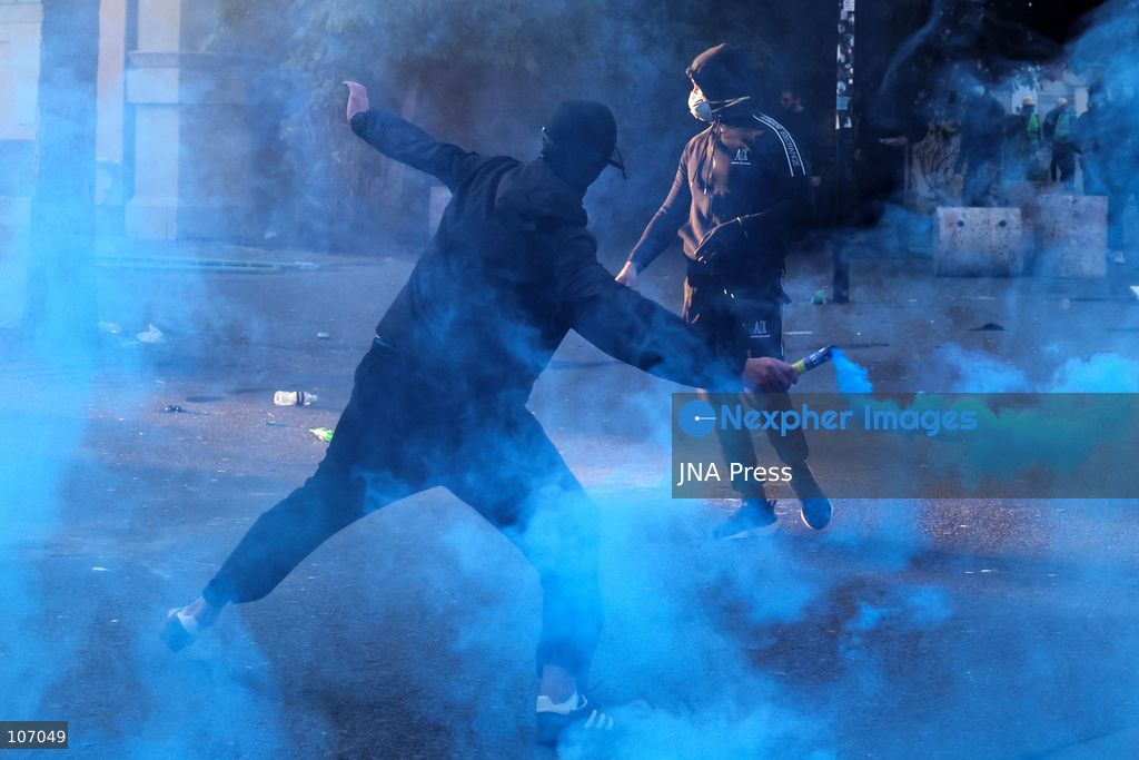 TIRANA, ALBANIA, OCTOBER 18, 2026: Demonstrators clash with riot police in Skanderbeg Square as student-led anti-government protests continue for a sixth consecutive day. Confrontations spread from the Ministry of Education to central Tirana, with protesters throwing stones and pyrotechnics while police deploy tear gas and water cannons. Demonstrators demand improved university conditions and the resignation of Prime Minister Edi Rama. (Photo by Vlasov Sulaj/JNA Press via Nexpher Images)