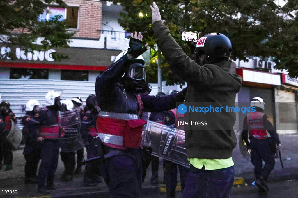 TIRANA, ALBANIA, OCTOBER 18, 2026: Demonstrators clash with riot police in Skanderbeg Square as student-led anti-government protests continue for a sixth consecutive day. Confrontations spread from the Ministry of Education to central Tirana, with protesters throwing stones and pyrotechnics while police deploy tear gas and water cannons. Demonstrators demand improved university conditions and the resignation of Prime Minister Edi Rama. (Photo by Vlasov Sulaj/JNA Press via Nexpher Images)