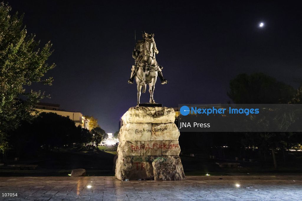 TIRANA, ALBANIA, OCTOBER 18, 2026: Demonstrators clash with riot police in Skanderbeg Square as student-led anti-government protests continue for a sixth consecutive day. Confrontations spread from the Ministry of Education to central Tirana, with protesters throwing stones and pyrotechnics while police deploy tear gas and water cannons. Demonstrators demand improved university conditions and the resignation of Prime Minister Edi Rama. (Photo by Vlasov Sulaj/JNA Press via Nexpher Images)