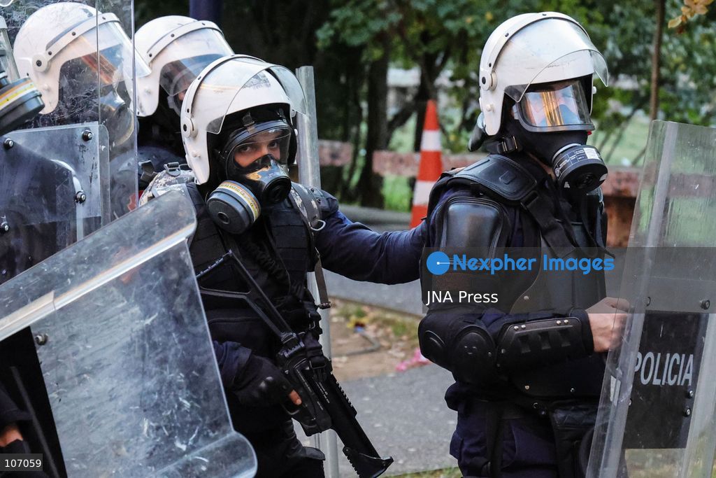 TIRANA, ALBANIA, OCTOBER 18, 2026: Demonstrators clash with riot police in Skanderbeg Square as student-led anti-government protests continue for a sixth consecutive day. Confrontations spread from the Ministry of Education to central Tirana, with protesters throwing stones and pyrotechnics while police deploy tear gas and water cannons. Demonstrators demand improved university conditions and the resignation of Prime Minister Edi Rama. (Photo by Vlasov Sulaj/JNA Press via Nexpher Images)