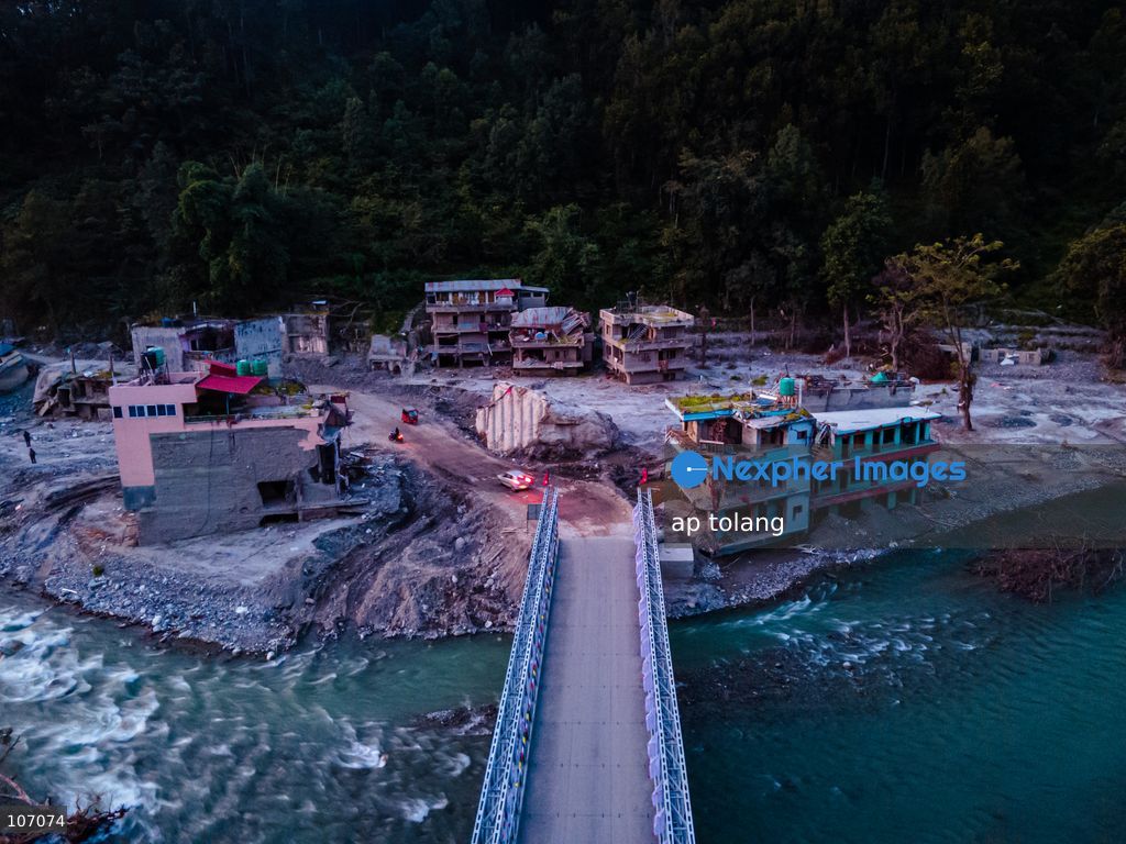 Rasuwa, NEPAL, October 14, 2026: An aerial view shows a newly installed Bailey bridge connecting the border areas of Nuwakot and Rasuwa districts in Nepal. the bridge was installed to restore road connectivity after severe flooding destroyed existing bridges on August 26, 2026. (Photo by ap tolang/Nexpher Images)