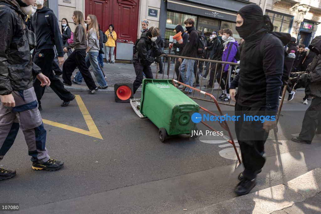 PARIS, FRANCE, OCTOBER 17, 2026: Demonstrators clash with riot police in and around Place de la République during protests against austerity and rising living costs, and in support of students demanding better school conditions. Makeshift barricades are erected and fires break out as police use tear gas and water cannons. Shops in surrounding streets are damaged and looted during the unrest. (Photo by Oualid Abdellaoui/JNA Press via Nexpher Images)