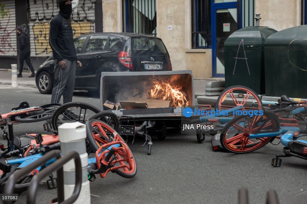 PARIS, FRANCE, OCTOBER 17, 2026: Demonstrators clash with riot police in and around Place de la République during protests against austerity and rising living costs, and in support of students demanding better school conditions. Makeshift barricades are erected and fires break out as police use tear gas and water cannons. Shops in surrounding streets are damaged and looted during the unrest. (Photo by Oualid Abdellaoui/JNA Press via Nexpher Images)