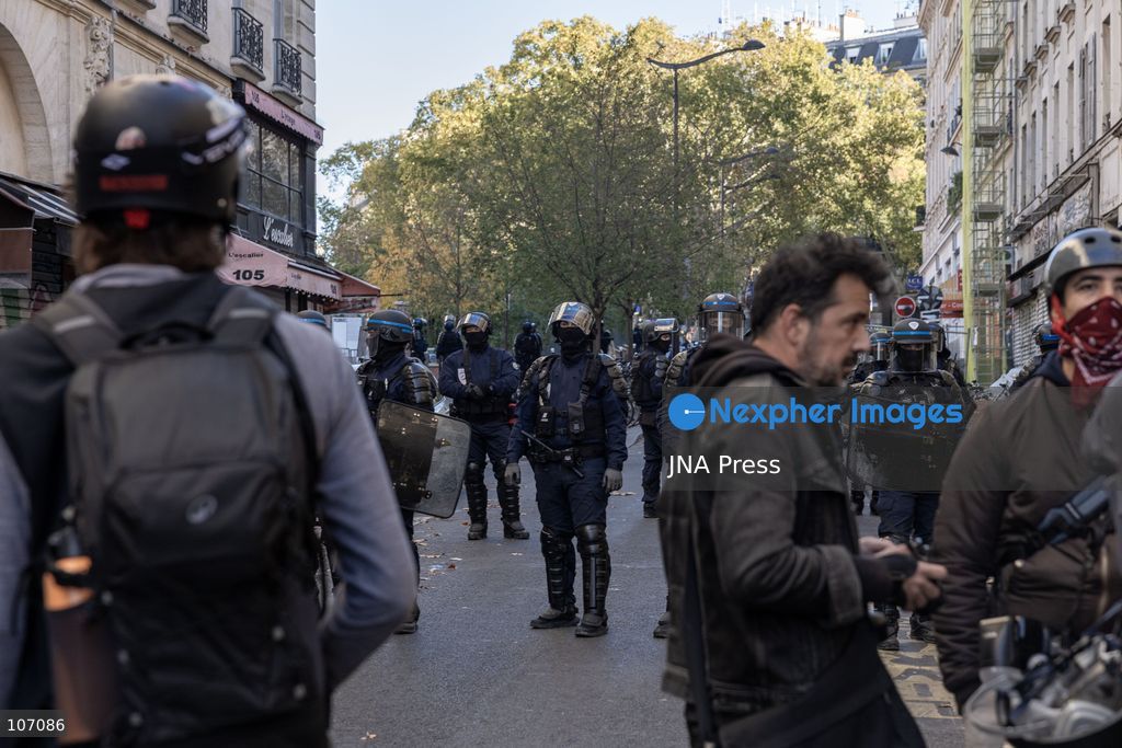 PARIS, FRANCE, OCTOBER 17, 2026: Demonstrators clash with riot police in and around Place de la République during protests against austerity and rising living costs, and in support of students demanding better school conditions. Makeshift barricades are erected and fires break out as police use tear gas and water cannons. Shops in surrounding streets are damaged and looted during the unrest. (Photo by Oualid Abdellaoui/JNA Press via Nexpher Images)
