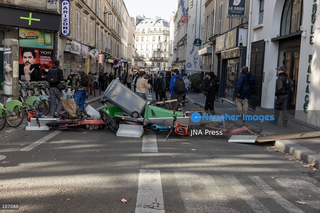 PARIS, FRANCE, OCTOBER 17, 2026: Demonstrators clash with riot police in and around Place de la République during protests against austerity and rising living costs, and in support of students demanding better school conditions. Makeshift barricades are erected and fires break out as police use tear gas and water cannons. Shops in surrounding streets are damaged and looted during the unrest. (Photo by Oualid Abdellaoui/JNA Press via Nexpher Images)