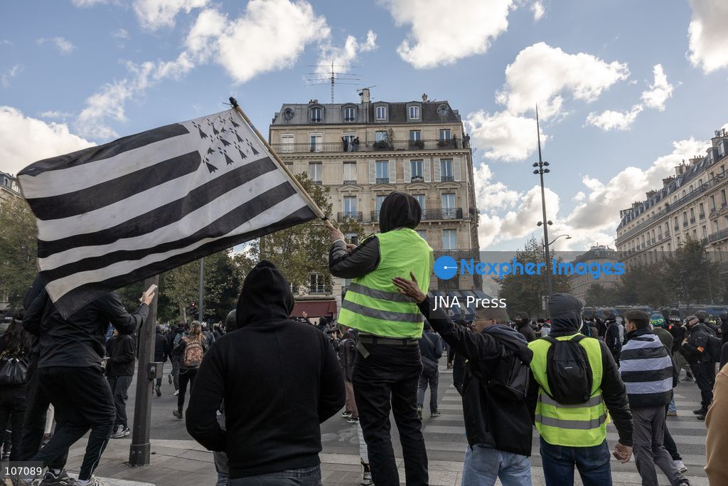 PARIS, FRANCE, OCTOBER 17, 2026: Demonstrators clash with riot police in and around Place de la République during protests against austerity and rising living costs, and in support of students demanding better school conditions. Makeshift barricades are erected and fires break out as police use tear gas and water cannons. Shops in surrounding streets are damaged and looted during the unrest. (Photo by Oualid Abdellaoui/JNA Press via Nexpher Images)