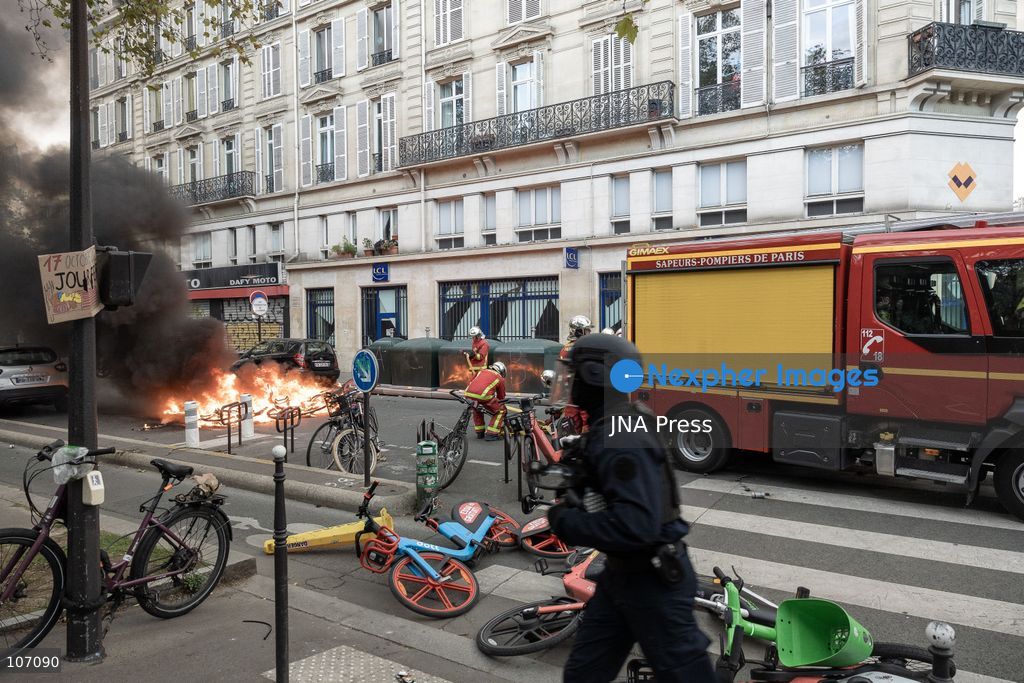 PARIS, FRANCE, OCTOBER 17, 2026: Demonstrators clash with riot police in and around Place de la République during protests against austerity and rising living costs, and in support of students demanding better school conditions. Makeshift barricades are erected and fires break out as police use tear gas and water cannons. Shops in surrounding streets are damaged and looted during the unrest. (Photo by Oualid Abdellaoui/JNA Press via Nexpher Images)