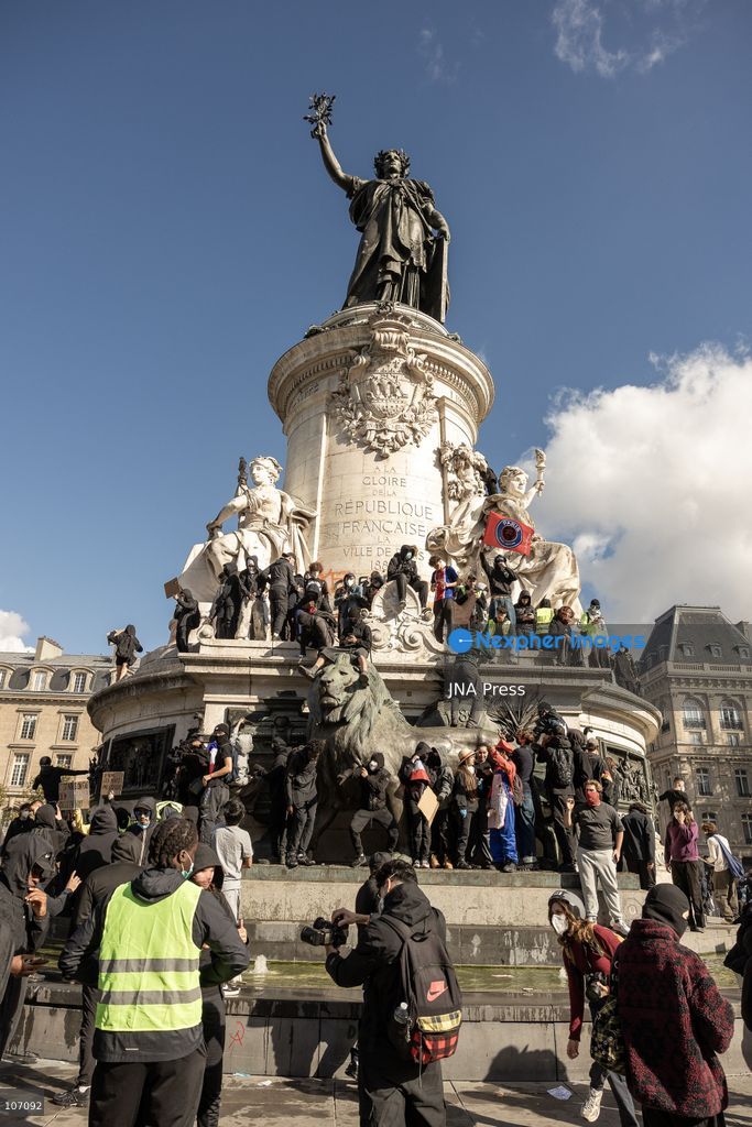 PARIS, FRANCE, OCTOBER 17, 2026: Demonstrators clash with riot police in and around Place de la République during protests against austerity and rising living costs, and in support of students demanding better school conditions. Makeshift barricades are erected and fires break out as police use tear gas and water cannons. Shops in surrounding streets are damaged and looted during the unrest. (Photo by Oualid Abdellaoui/JNA Press via Nexpher Images)